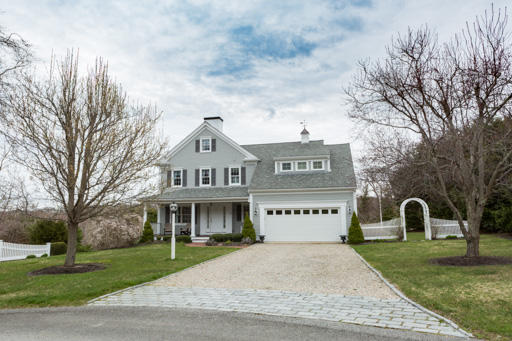 140 Great Marsh Road West Barnstable, MA 02668 - Photo 2 of 30 a view of a house with a yard and large tree