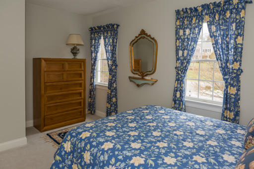 140 Great Marsh Road West Barnstable, MA 02668 - Photo 23 of 30 a bedroom with a bed and a window