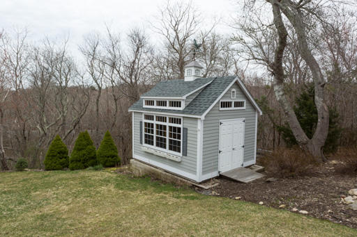 140 Great Marsh Road West Barnstable, MA 02668 - Photo 29 of 30 a front view of a house with a yard