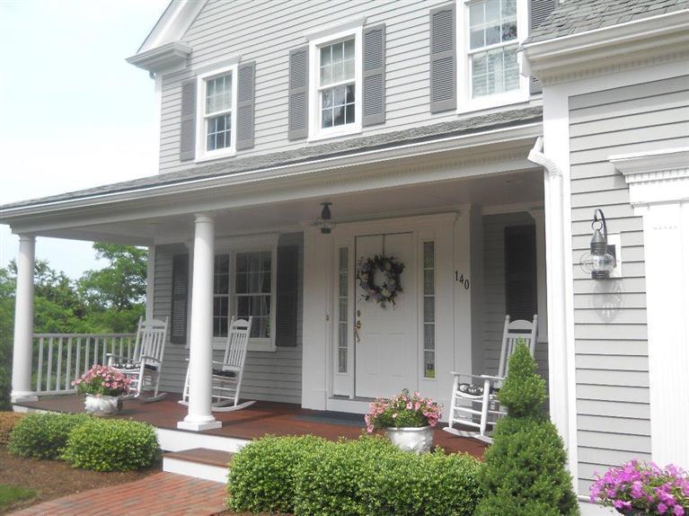 140 Great Marsh Road West Barnstable, MA 02668 - Photo 3 of 30 a front view of a house with a yard