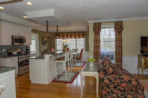 140 Great Marsh Road West Barnstable, MA 02668 - Photo 9 of 30 a living room with furniture a flat screen tv and large window