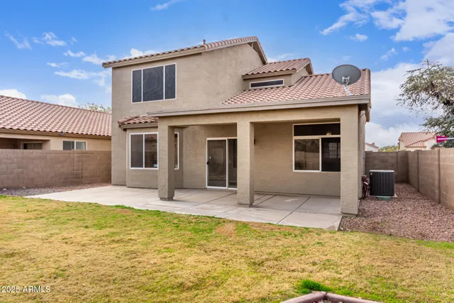 a bathroom with a sink and shower