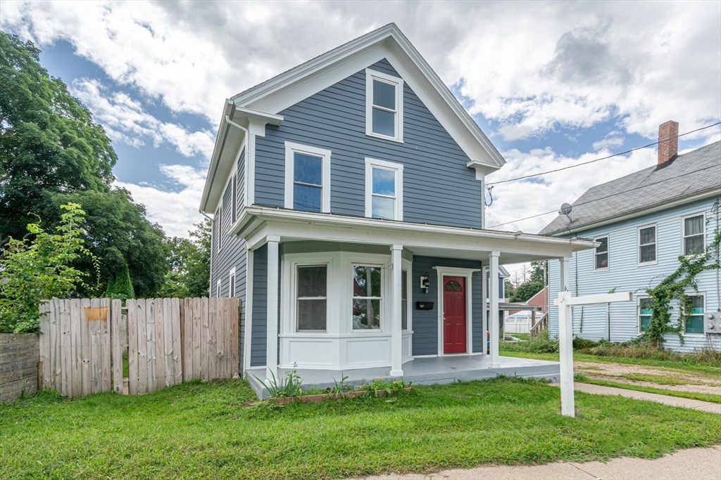 64 Pleasant Street Ware, MA 01082 - Photo 2 of 38 a front view of a house with a yard