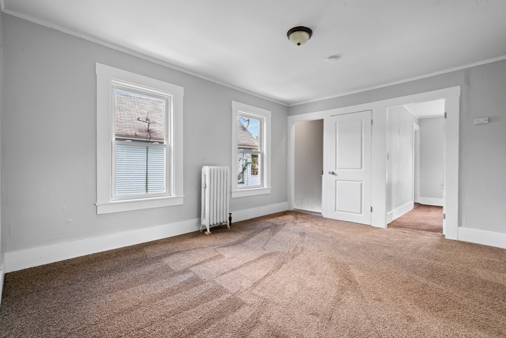 64 Pleasant Street Ware, MA 01082 - Photo 21 of 38 a view of an empty room with a window