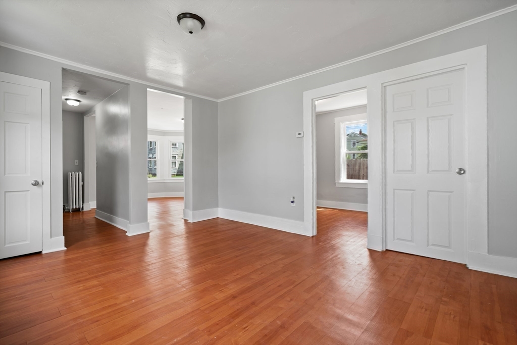 64 Pleasant Street Ware, MA 01082 - Photo 23 of 38 a view of empty room with wooden floor