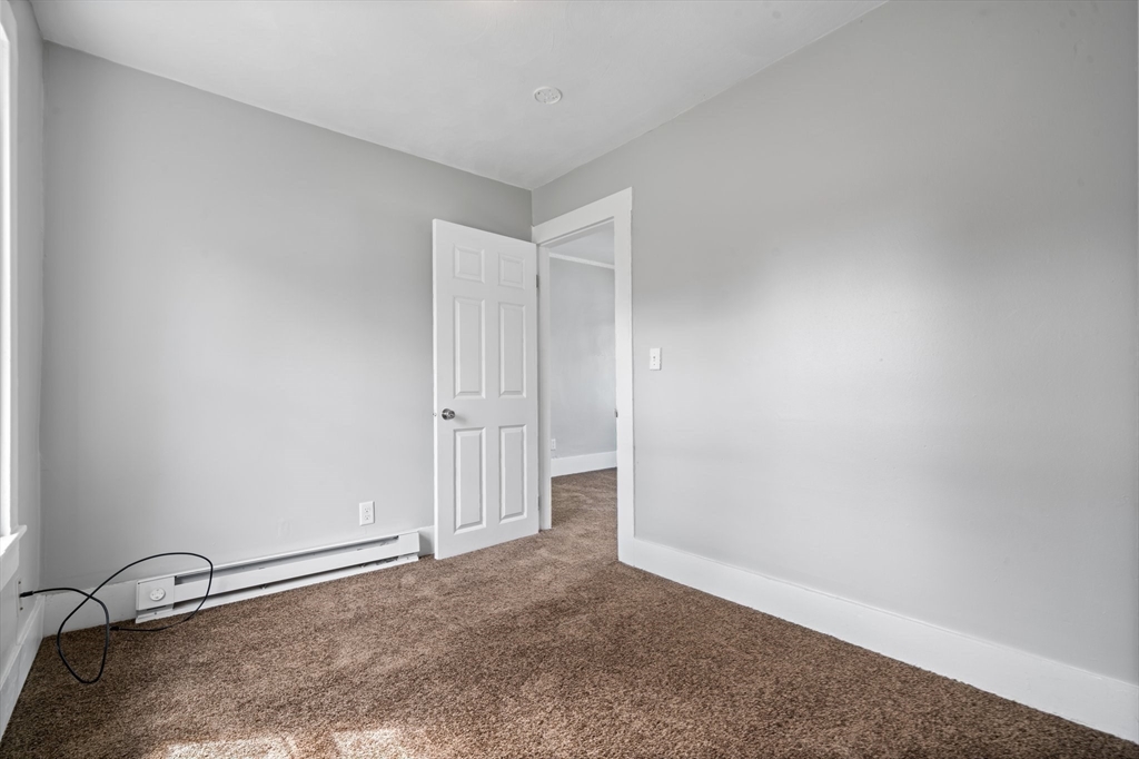 64 Pleasant Street Ware, MA 01082 - Photo 32 of 38 a view of an empty room