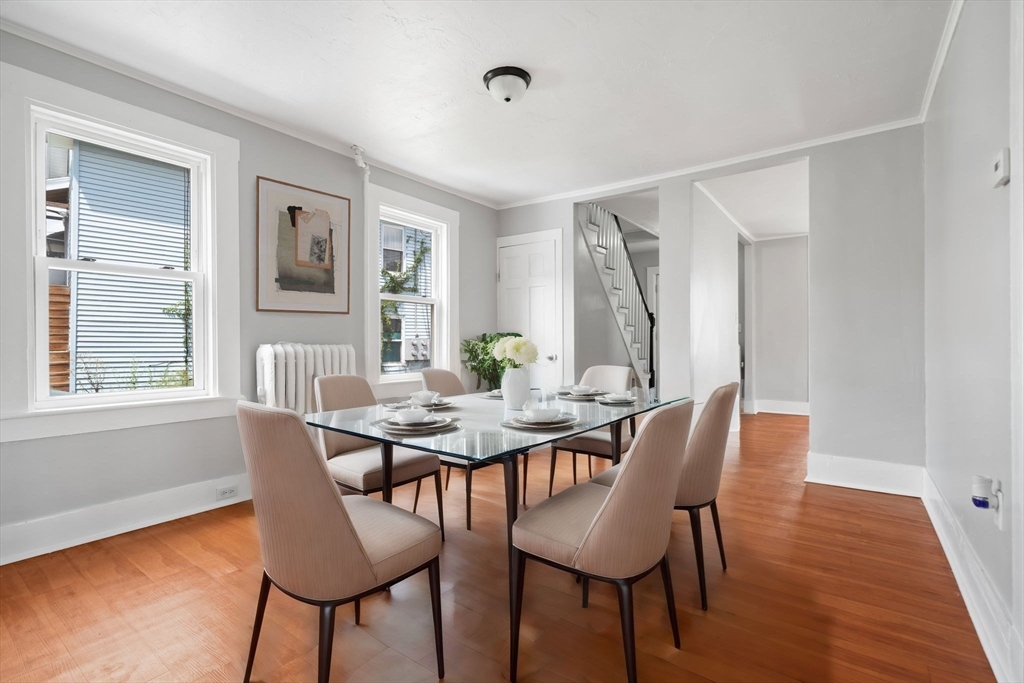 64 Pleasant Street Ware, MA 01082 - Photo 6 of 38 a view of a dining room with furniture and wooden floor