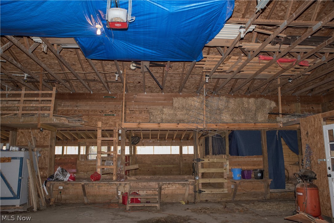 3810 Dawley Road Ravenna, OH 44266 - Photo 24 of 35 Don't Worry! The Tarps are to protect equipment from Swallows nesting in the rafters - No Roof Issues!