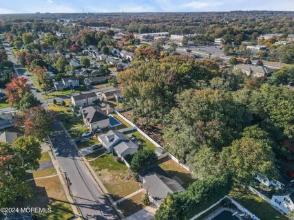 an aerial view of a house with a garden