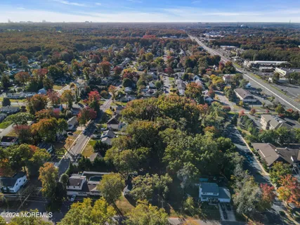 an aerial view of a house with a garden