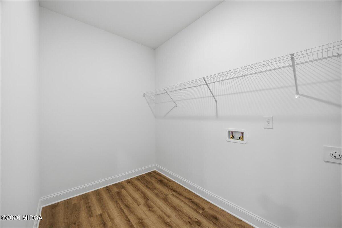2762 Boxankle Road Forsyth, GA 31029 - Photo 11 of 19 a view of a room with racks on the wall