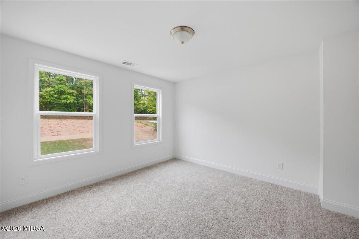 2762 Boxankle Road Forsyth, GA 31029 - Photo 16 of 19 an empty room with windows