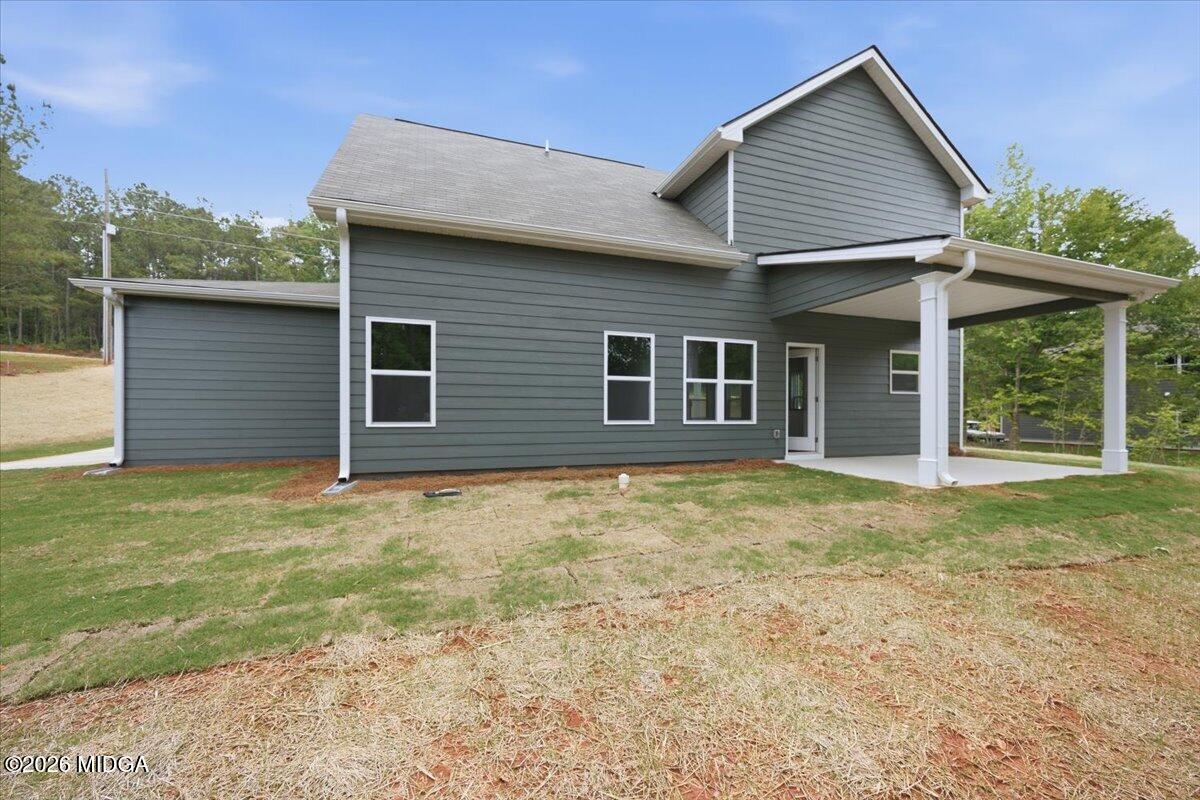2762 Boxankle Road Forsyth, GA 31029 - Photo 19 of 19 front view of a house with a yard