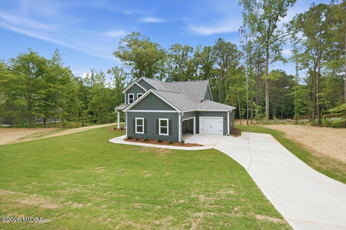 2762 Boxankle Road Forsyth, GA 31029 - Photo 2 of 19 a front view of a house with a yard