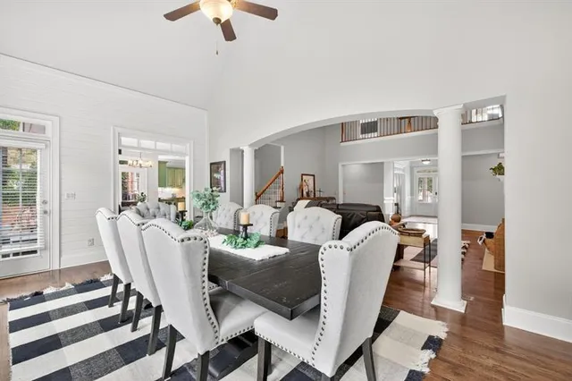 a bedroom with furniture and a flat screen tv