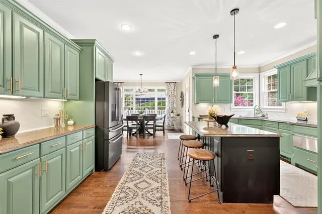 a bed room with furniture and a flat screen tv