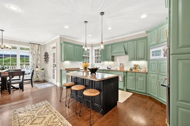 a view of hallway with wooden floor