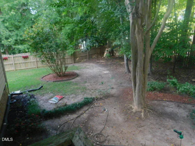 a view of a backyard with garden