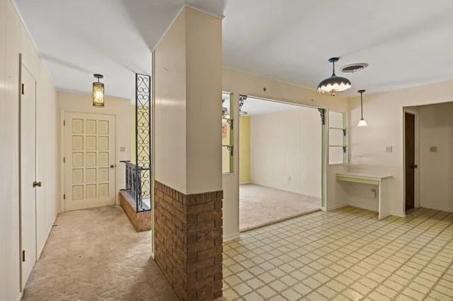 a bathroom with a shower and a sink