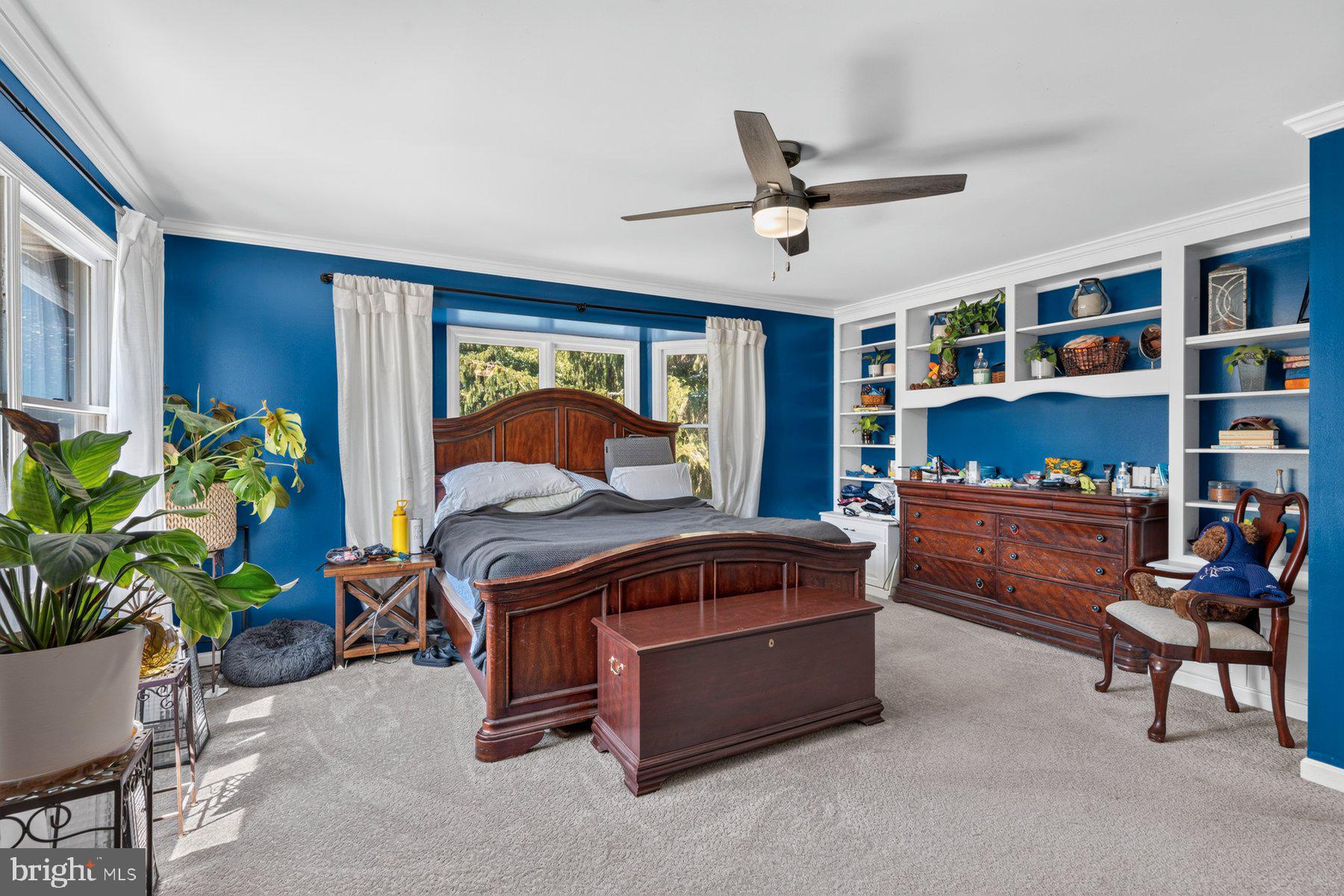 49 Rockland Road Westminster, MD 21158 - Photo 50 of 66 a bedroom with a bed and a potted plant