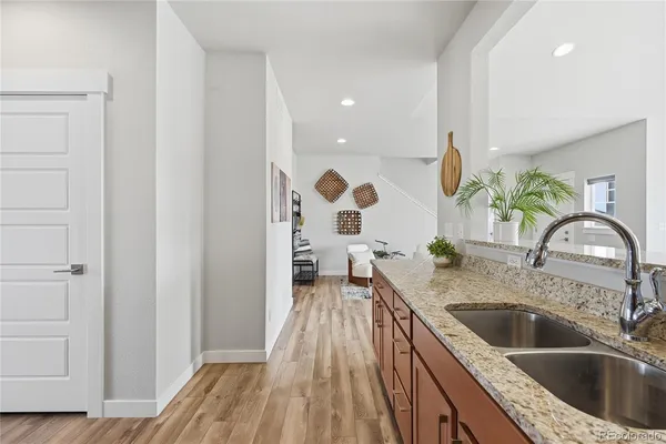 a kitchen with a sink and a microwave