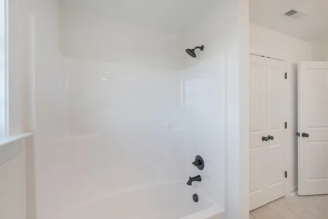 a bathroom with a bathtub