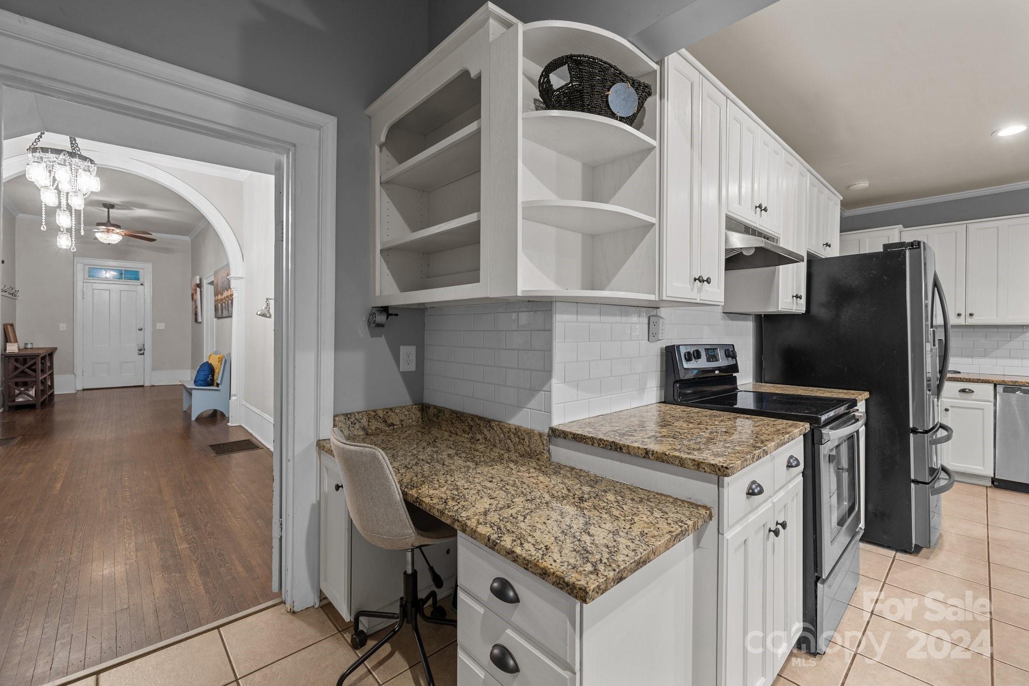 1189 Rhyne Road Clover, SC 29710 - Photo 17 of 48 a kitchen with a stove a refrigerator and a oven
