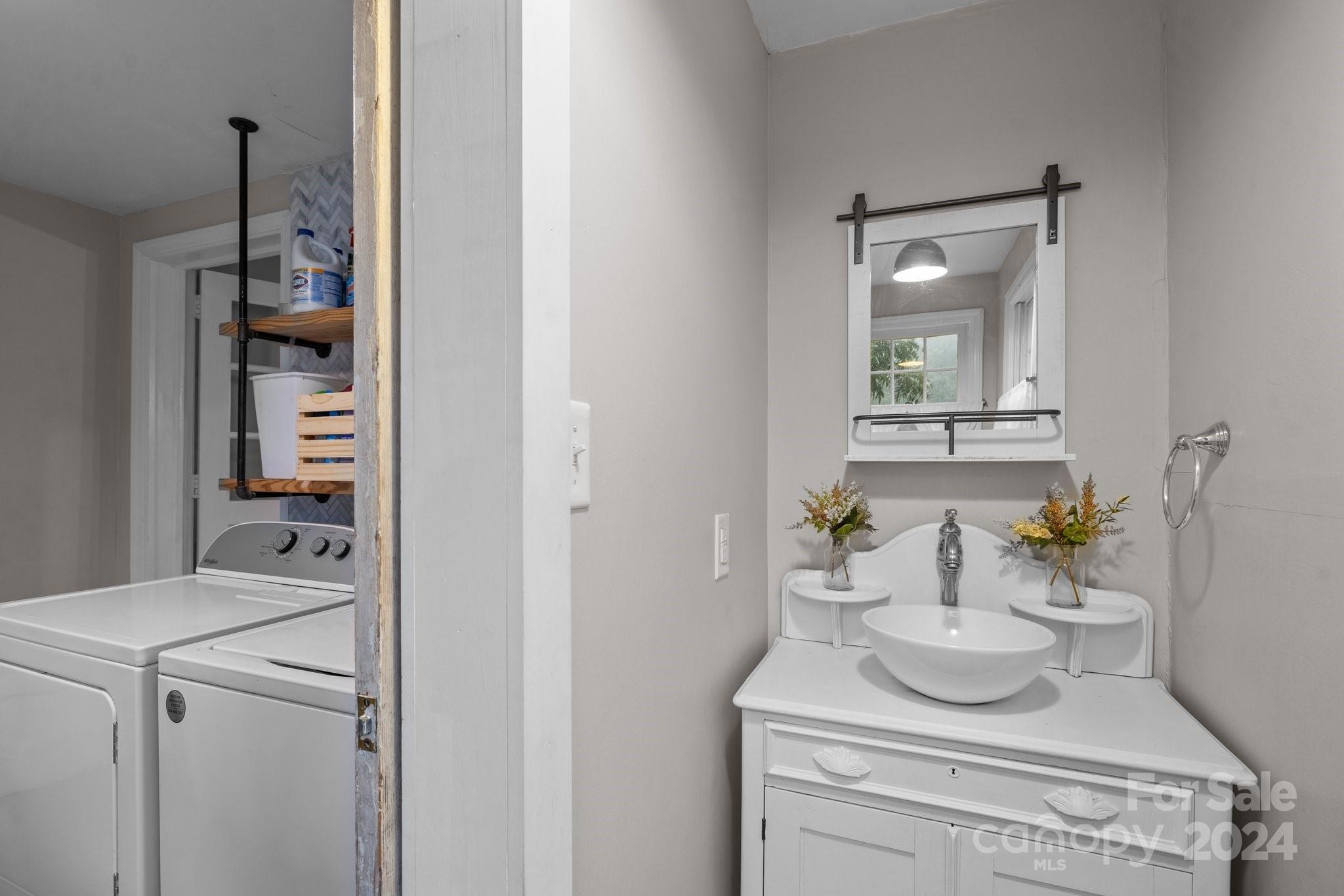 1189 Rhyne Road Clover, SC 29710 - Photo 23 of 48 a kitchen with a refrigerator and a table