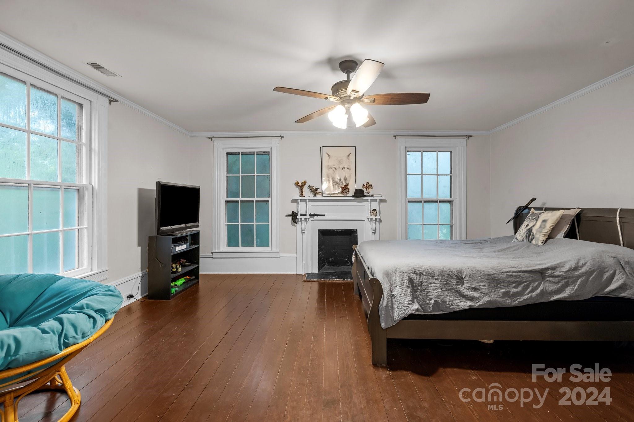 1189 Rhyne Road Clover, SC 29710 - Photo 30 of 48 a bedroom with a bed and a flat screen tv