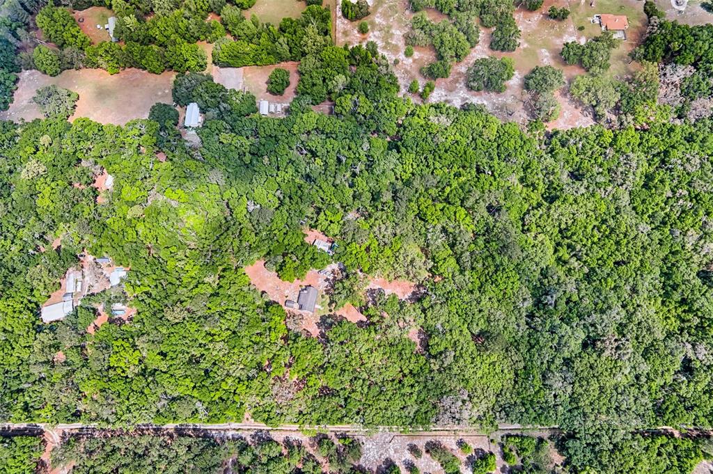 0 Southwest 157th Avenue Archer, FL 32618 - Photo 7 of 16 an aerial view of a house with a yard and garden