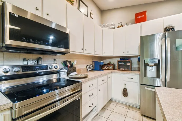 a bedroom with a bed and furniture