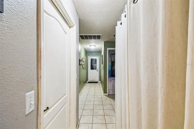 a view of a playground with basketball court