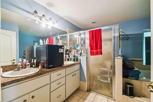 an aerial view of a house with a swimming pool