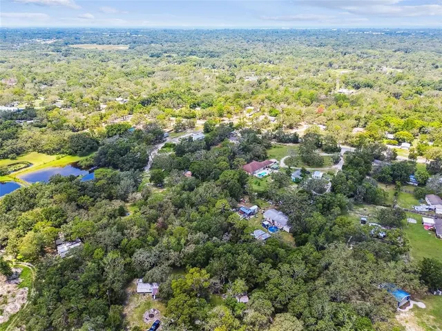 a view of a house with a big yard
