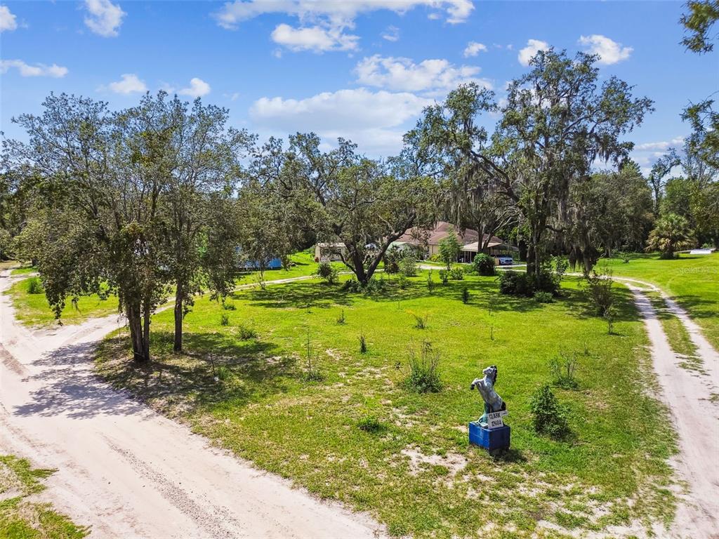 12604 Choctaw Trail Hudson, FL 34669 - Photo 78 of 92 a view of a garden with an outdoor space
