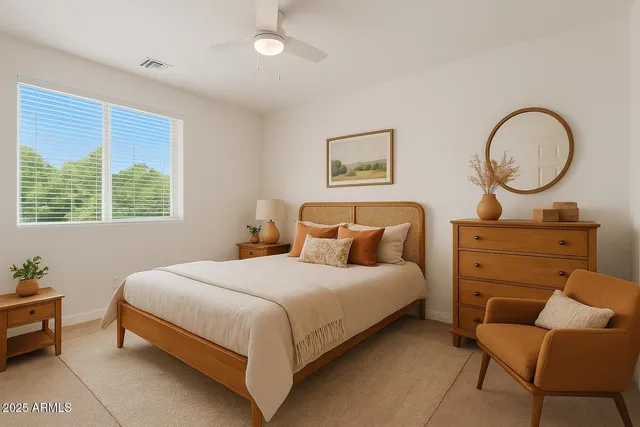 a bedroom with a bed and furniture