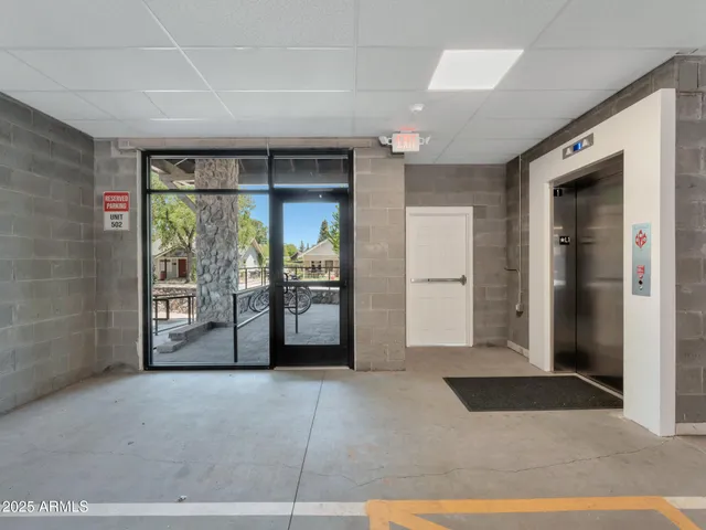 a black and white photo of a living room