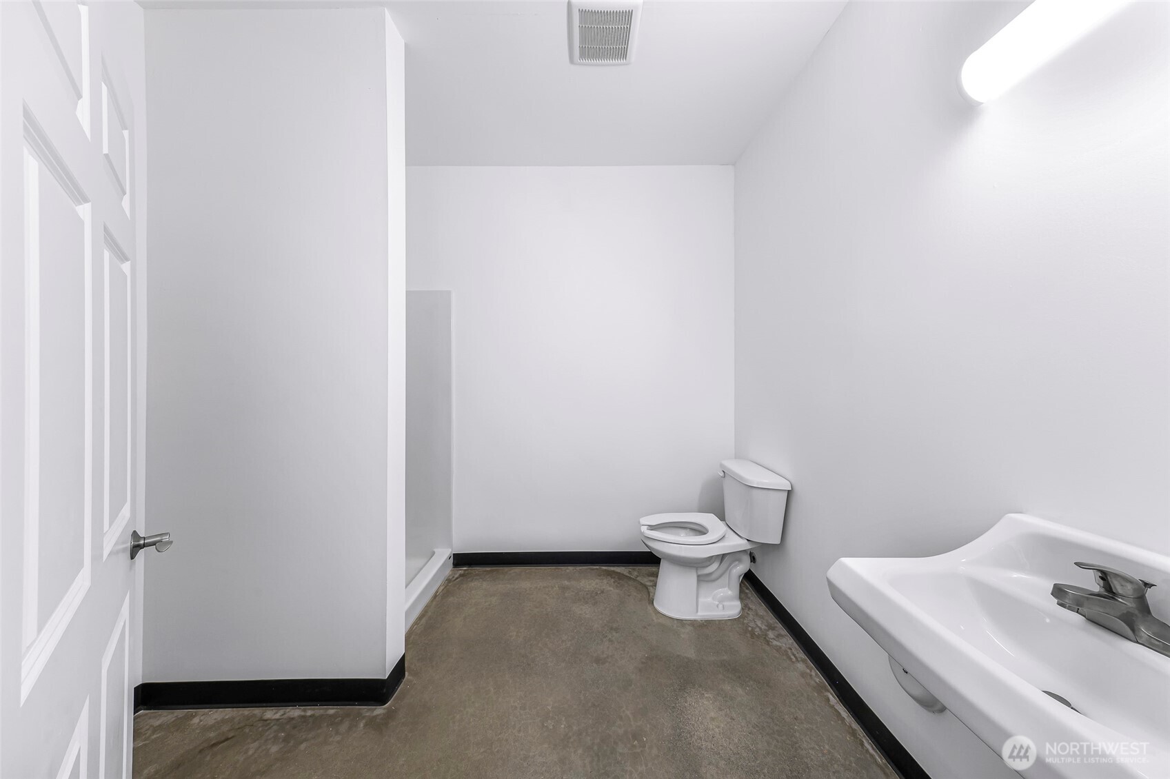 1929 Baltic Way, Unit C110 Ferndale, WA 98248 - Photo 16 of 19 a bathroom with a toilet and a sink