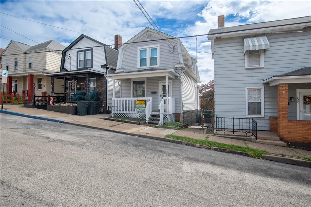 431 East Washington Street Rochester, PA 15074 - Photo 2 of 32 a view of a street with cars