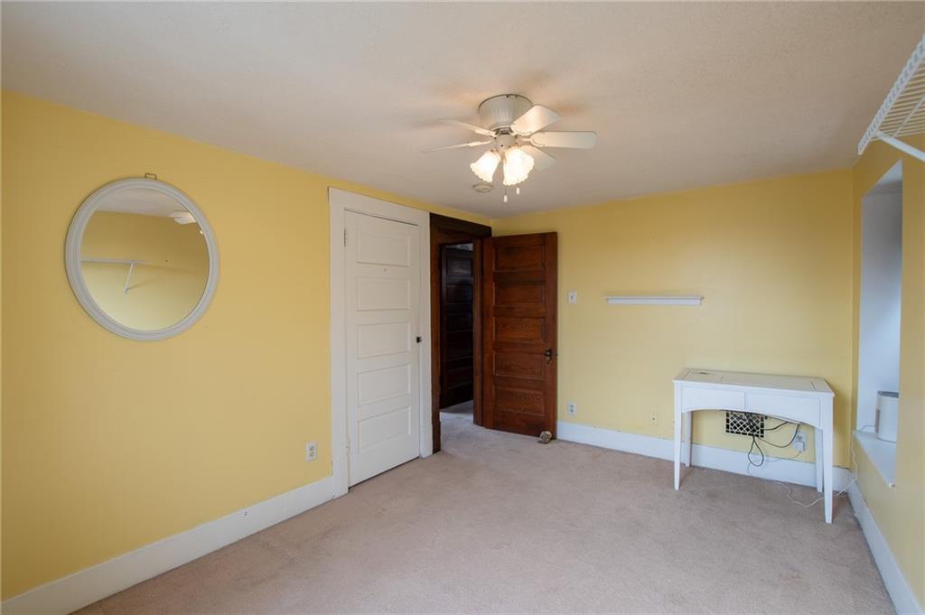 431 East Washington Street Rochester, PA 15074 - Photo 22 of 32 a view of a room with a sink and a mirror