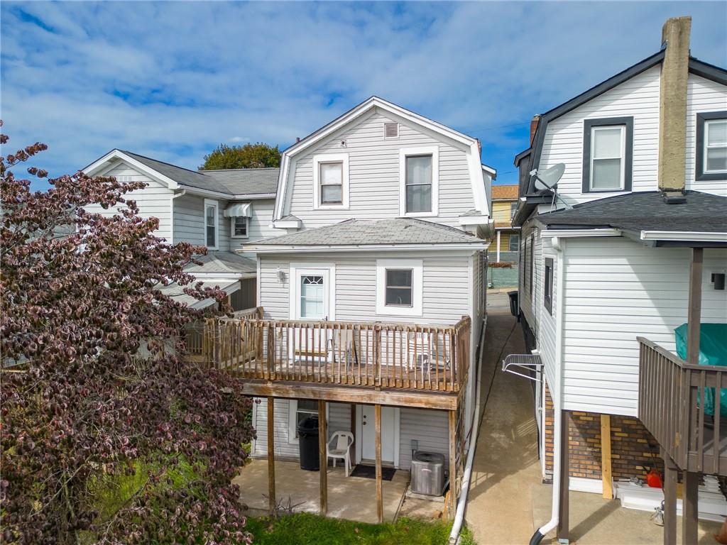 431 East Washington Street Rochester, PA 15074 - Photo 30 of 32 a front view of a house with a porch