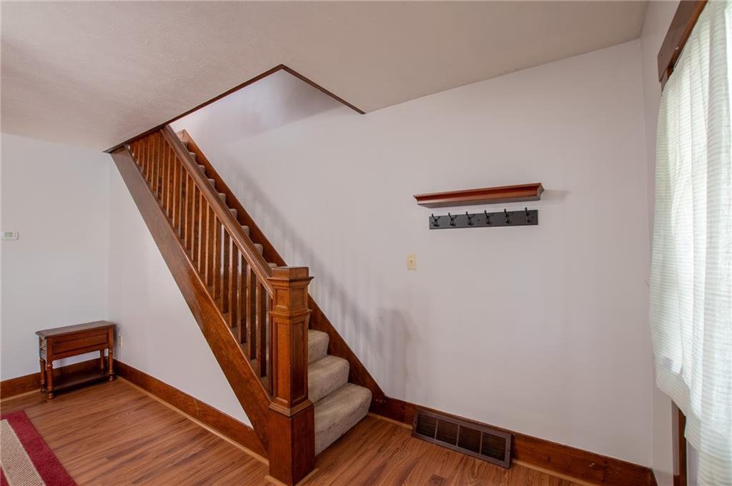 431 East Washington Street Rochester, PA 15074 - Photo 10 of 32 a view of a hallway with staircase