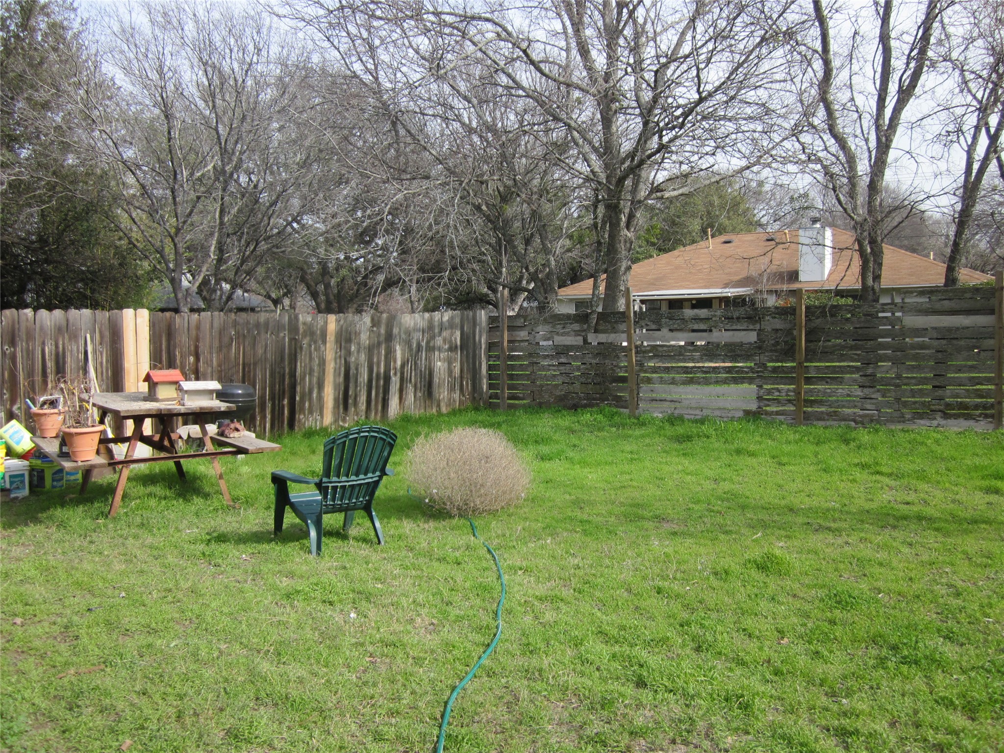 102 Verna Spur, Unit B Georgetown, TX 78628 - Photo 6 of 18 View of fenced backyard