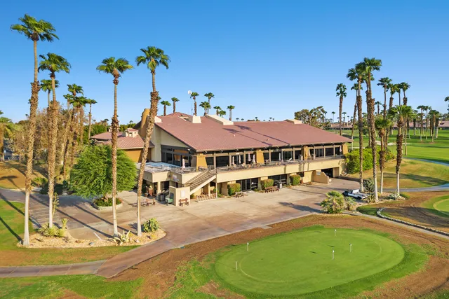 a view of outdoor space with patio furniture and garden