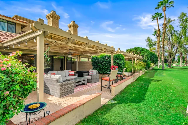 outdoor area with lots of red furniture
