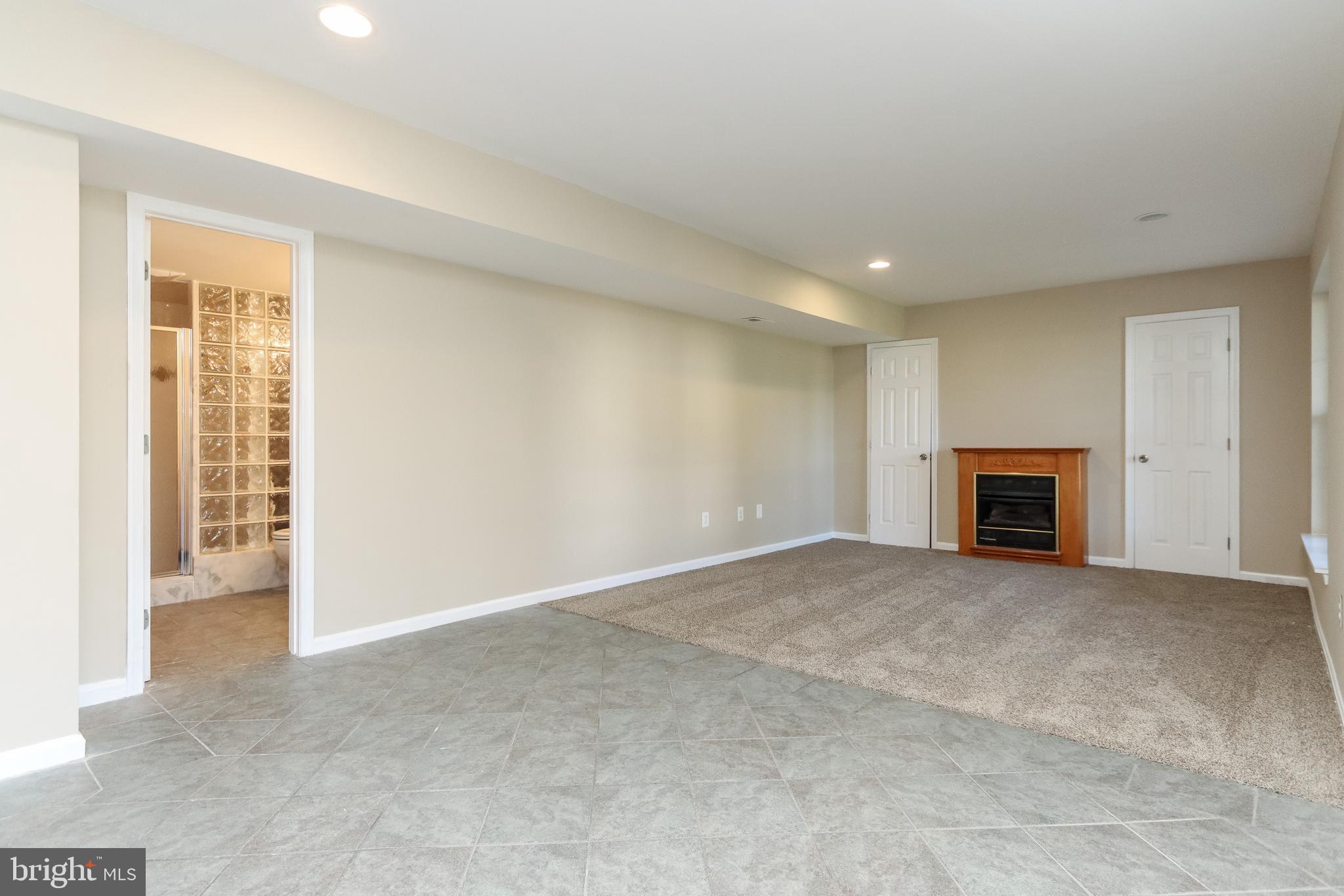 11244 Country Club Road New Market, MD 21774 - Photo 35 of 45 Recreation Room with Gas Fireplace