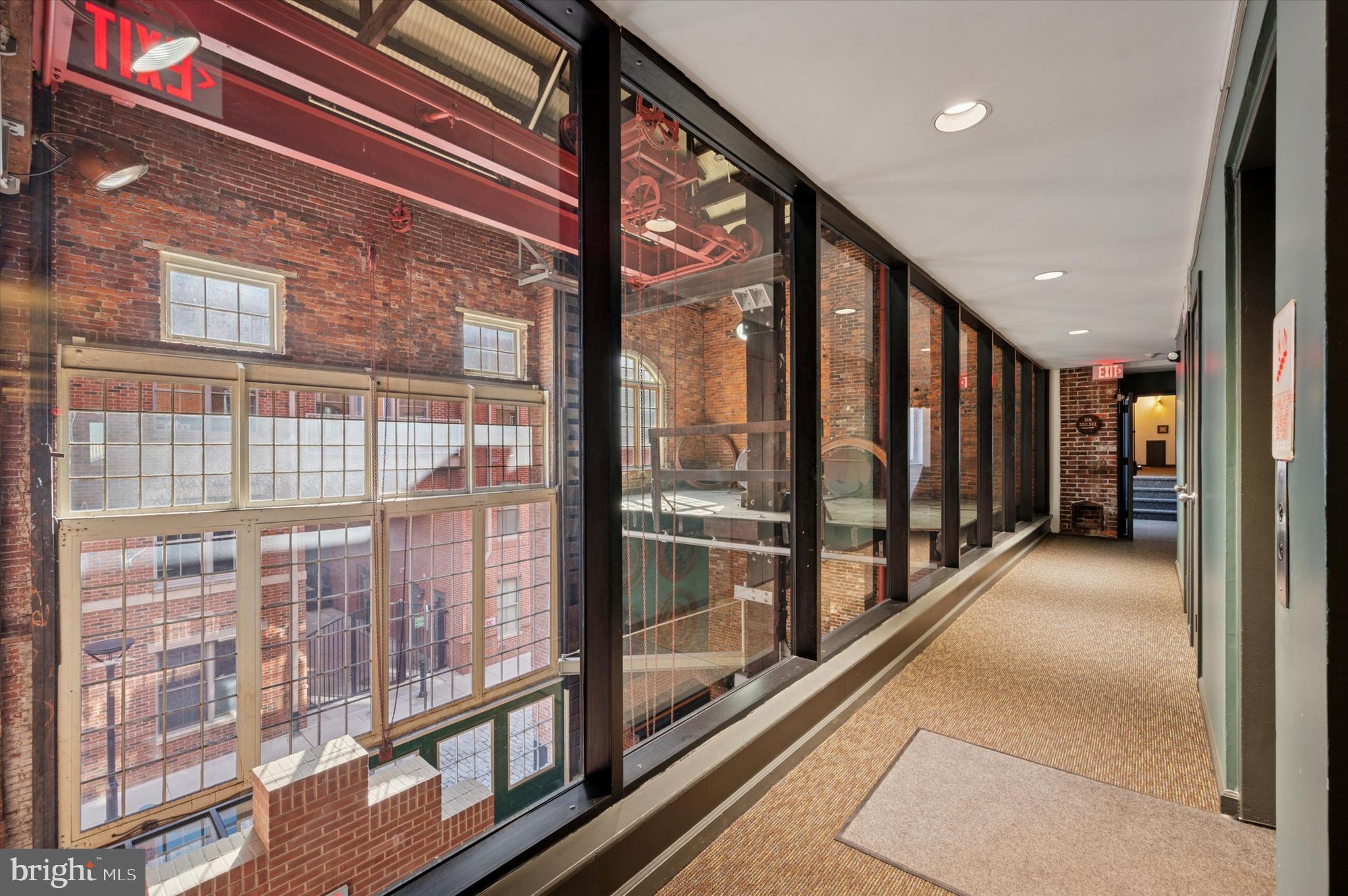 130 North Bread Street, Unit 310 Philadelphia, PA 19106 - Photo 4 of 16 a view of staircase with large windows