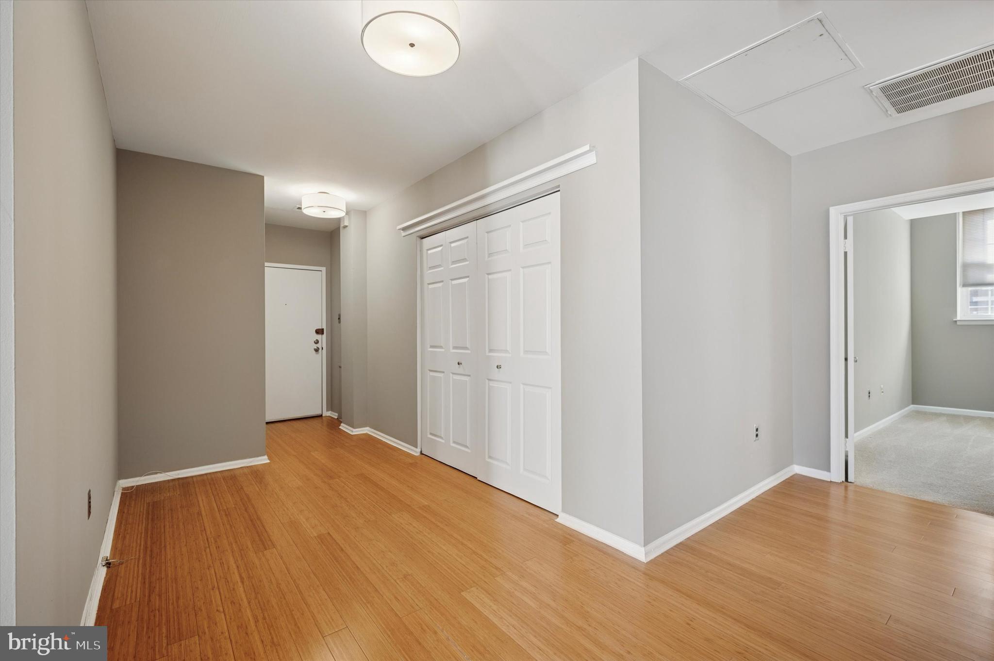 130 North Bread Street, Unit 310 Philadelphia, PA 19106 - Photo 5 of 16 a view of empty room with wooden floor