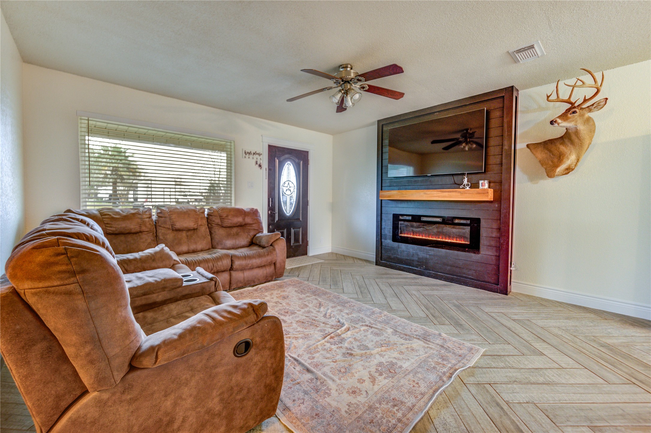 7706 Colston Place Santa Fe, TX 77510 - Photo 4 of 16 a living room with furniture and a flat screen tv