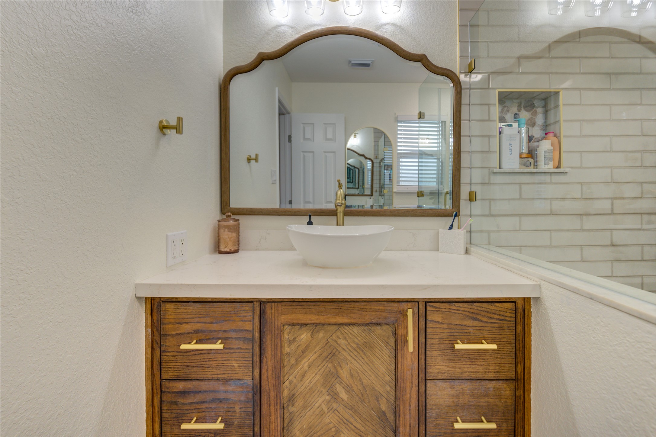 7706 Colston Place Santa Fe, TX 77510 - Photo 10 of 16 a bathroom with a sink and a mirror